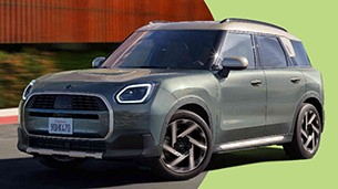 MINI Countryman driving three-quarter side view MINI Countryman driving three-quarter side view